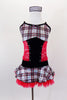 Red, black & silver tartan school-girl costume has tartan bust and skirt attached by red sequined lace torso with crystaled black velvet center and waistband. Comes with crystal air barrette. Front