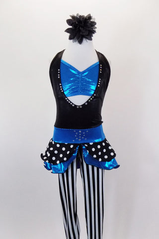 Black deep plunge halter unitard with crystal accents has black & white striped legs & attached turquoise metallic bandeau bra & waist with polka dot peplum. Comes with hair accessory. Front