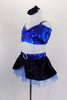 3-piece, electric blue costume has all sequined bralette with blue cap sleeves & straps. Skirt is layers of blue tulle with black velvet glitter overlay. Left side