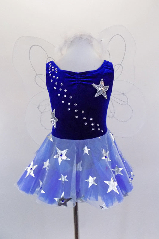 Leotard dress has navy front & nude mesh back with attached white sheer fairy wings and star covered skirt. Torso that has silver star appliques and crystals.Comes with white fairy hair wreath with ribbons. Front