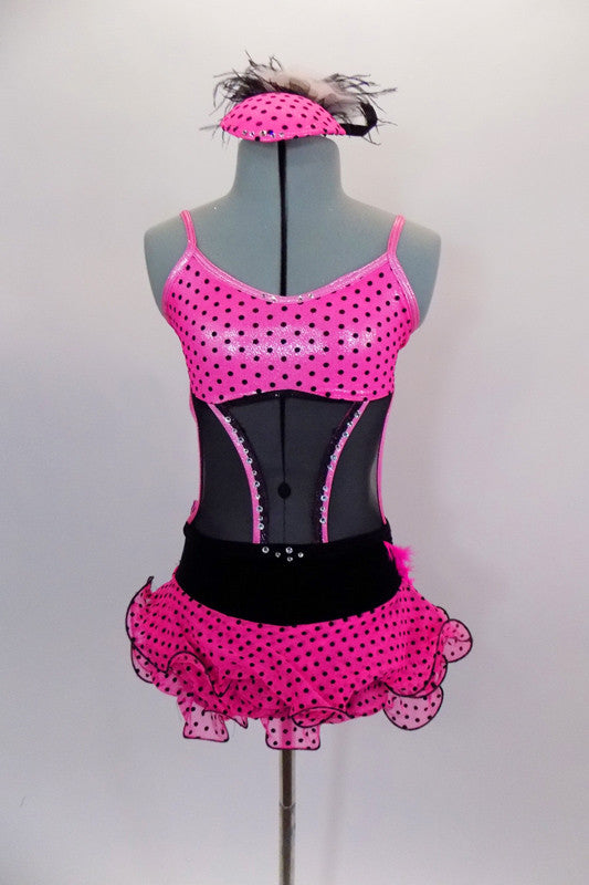 Pink & black velvet polka dot costume has mesh skirt & matching bust area. The black mesh torso has pink crystaled banding. Back has velvet bow & pink feathers. Comes with matching hat accessory, Front