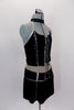 Nude mesh & black velvet lace front leotard has attached skirt with silver piping, crystals & faux-belt. Silver straps attach to a black velvet choker collar. Comes with hair accessory. Side