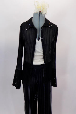 Black straight leg pant has cream & grey pinstripes has waistband that clasps at side with accent button. Black chiffon pleated blouse sits over glittery cream halter top. Comes with hair accessory. Front