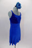 Royal blue empire waist leotard dress has crystal covered velvet bodice with double cross back straps. Skirt is a textured crepe stretch that flows nicely. Comes with large floral hair accessory. Side