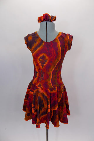 Tie-Dye style flowy tank dress with cap sleeves has scoop neck front and back in shades of reds browns & oranges create the 60s vibe. Comes with hair accessory. Front