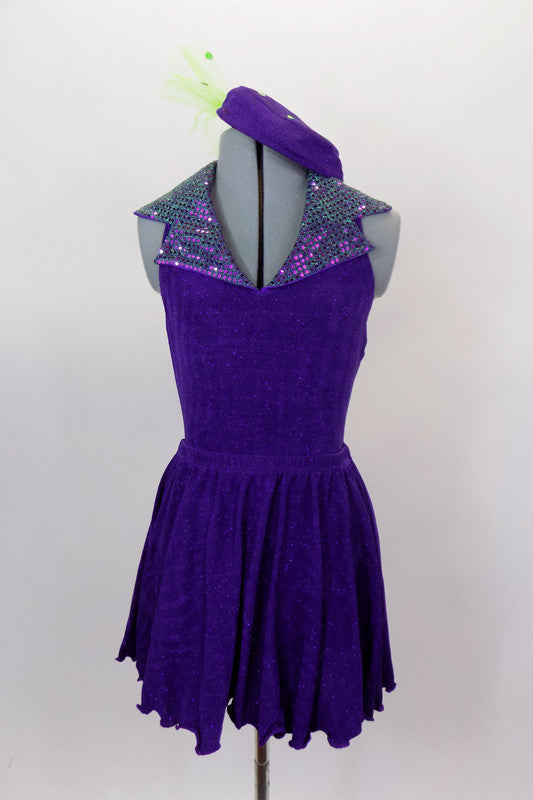 Purple sparkle fully lined halter leotard has green and purple sequined lapel collar. Comes with matching purple skirt, purple gauntlets & pill hat. Front