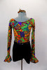 Short unitard with Mexican inspired print scoop neck top has long flounce sleeves. The waistband is accented with a thick band of black sequins. Comes with hair scrunchie. Back