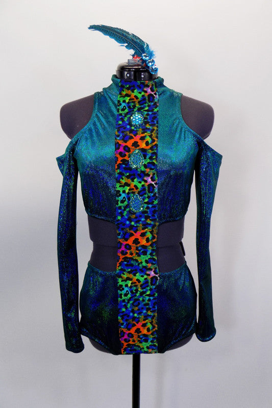 Teal glitter leotard has high collar with long sleeves & open shoulders. The sides are open, the back zips, & there is a colorful animal print stripe on torso with jeweled buttons. Comes with feather hair accessory. Front