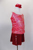 2-piece costume has crimson metallic camisole half top with starburst pattern that laces up at back. Matching red velvet skirt has side slits & attached brief. Comes with matching hair accessories. Side