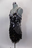 Ultimate flapper dress is black and silver covered entirely in dangling teardrop paillette sequins with beaded banding & circular side pattern of beading. Comes with hair accessory. Side