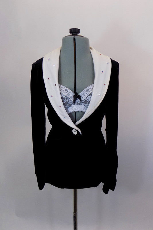 Black velvet blazer has white button & white crystaled lapels. Below the blazer is a shimmery white lace bra with black underlay. Comes with black velvet briefs. Front