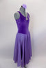 Lavender velvet leotard dress has  pinch front, crystal brooch & low back. Layers of flowing lavender chiffon that make up the knee length skirt.  Comes with lavender floral hair accessory. Side