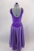 Lavender velvet leotard dress has  pinch front, crystal brooch & low back. Layers of flowing lavender chiffon that make up the knee length skirt.  Comes with lavender floral hair accessory. Back
