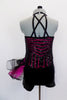 Short unitard has halter neck with a fully sequined body of fuchsia & black sections of stripes & back-cross cross strap design. Comes with black headband. Back