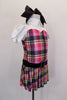 School girl themed pink & black tartan dress with rhinestone accent belt has upper chest that has white with pouf sleeves, white shirt collar & keyhole back. Comes with large black hair bow. Side
