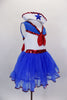 Blue and white leotard dress had white center, blue sparkle collar & shoulders edged with red sequin. The attached skirt is layers of blue tricot with red edge. Comes with sailor hat, red back bow and ruffled socks. Side