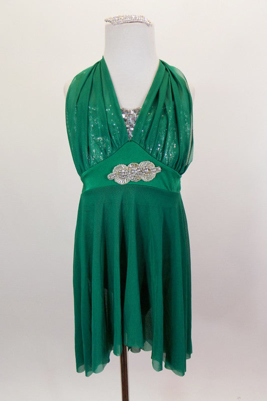 Emerald green mesh halter neck leotard dress has empire waist with silver applique & triangular draping over silver sequin bust with nude shoulder straps. Comes with crystal barrette. Front