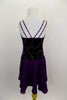 Dark purple velvet pinch front leotard dress has silver swirls on front torso with double cross straps are covered in crystals. Attached skirt is purple chiffon. Back