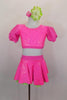 3-piece costume has neon pink bubble print skirt with green ruffled petticoat & attached panty. Tops include a green pleather bra below pouf sleeved half top. Comes with hair  accessory. Front