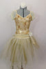 Gold romantic tutu has cream mesh pouf sleeves, cream & gold beaded lace overlay. Long gold & cream crystal tulle skirt has wide waistband with flower detail. Comes with cream floral hair accessory. Front