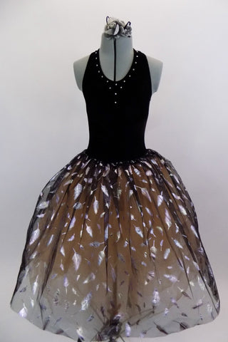 Black velvet upper bodice has attached romantic tutu portion with layers of blush tulle covered by sheer black organza overlay covered with silver leaves. Front