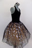 Black velvet upper bodice has attached romantic tutu portion with layers of blush tulle covered by sheer black organza overlay covered with silver leaves. Side