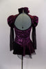 Corset style costume has purple sateen and black mesh pouf sleeves. Neckline is a Queen Anne style with ruffled neck & keyhole back. Has attached side bustle. Back