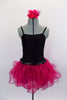 Black camisole style short unitard has attached hot pink sequin dotted curly hem ruffle skirt. Comes with a black & silver sequined short blazer coat. Comes with hair accessory.  Front without jacket