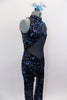 Black velvet based high neck unitard has turquoise and silver glitter swirl design. The back and stomach is glitter mesh & costume zips at back. COmes ith hair accessorySide