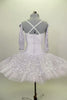 White platter tutu has silver sequined center on white bodice. Has matching silver sequined overlay over white professional tutu. Comes with gauntlets & tiara. Back