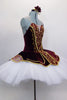 Burgundy red velvet sweetheart Russian style, 5 panel bodice comes with 10 layer pleated professional tutu with matching overlay, gold braid & lace accents. Comes with hair accessory. Right side