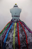 2- piece tutu ensemble has grey stone-base with frayes. The halter top has matching long skirt with sequined ribbon-like accents over a hoop style underskirt. Back