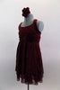 Deep maroon glitter mesh halter dress has attached panty. Pretty rose ribbon bodice & angled straps give it a delicate touch. Comes with rose hair accessory. Side