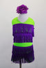 Layers of purple fringe spice up the lime green halter collar and shorts of this sassy two piece costume . Comes with purple floral hair accessory. Front