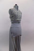 Grey two piece costume has asymmetrical rose ribbon half-top with gold accents. Back straps join below right shoulder blade. High waisted short has long skirt. Side