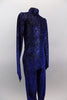 Deep blue velvet, high neck, long sleeved full unitard has iridescent silver vein pattern throughout. The low open back has single wide band across back. Done