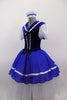 Blue & white sailor themed romantic ballet dress has white pouf sleeves & velvet bodice with lace-up  front. Blue skirt overlay & collar have white ribbon edge over layers of white tulle. Comes with matching sailor hat. Left side