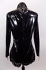 Black patent leather-look long sleeved, high collar, short unitard zips at back. It is  The electric blue lining peeks through slashes in the pleather. Back