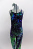 Stretch velvet full unitard with waves of purples greens & blues has silver pattern throughout. Has crystal accents at front & on bow accent of low back. Comes with hair accessory. Front