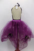 Purple glitter velvet bodice lined with black satin roses at top & on looped purple tulle skirt of this costume with sheer nude back with black edging. Comes with black rose hair accessory. Back