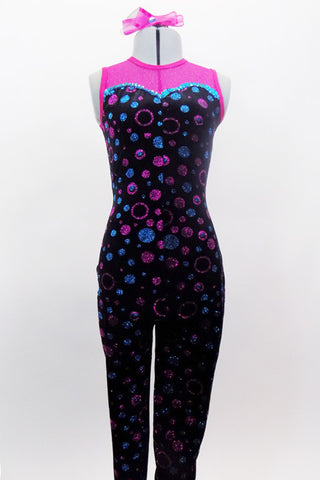 Full black velvet unitard has pink sheer back & upper chest. Sweetheart neckline has blue sequin edge, velvet is covered with pink & blue bubbles & zips at back. Comes with pink bow hair accessory. Front