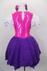 Bright pink bodice with large white pouf sleeves & layered, purple skirt. Has attached white pinafore apron with lace ruffle. Comes with stockings & hair bow. Back