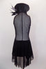 Black short unitard dress has V-front halter neckline connected to sheer black mesh back. Has attached open front black glitter mesh skirt & jeweled waist. Comes with matching hair accessory. Back