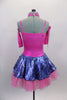 Hot pink camisole leotard has white fringe on neck with crystal heart accent. The skirt is a denim look pattern with sequins & bubble-gum pink petticoat. Comes with fringe gauntlets. Back