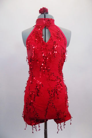 Red short unitard has red dangle sequins, peek-a-boo front & high collar. Fully open back had two vertical straps from neck to waist. Comes with hair accessory. Front