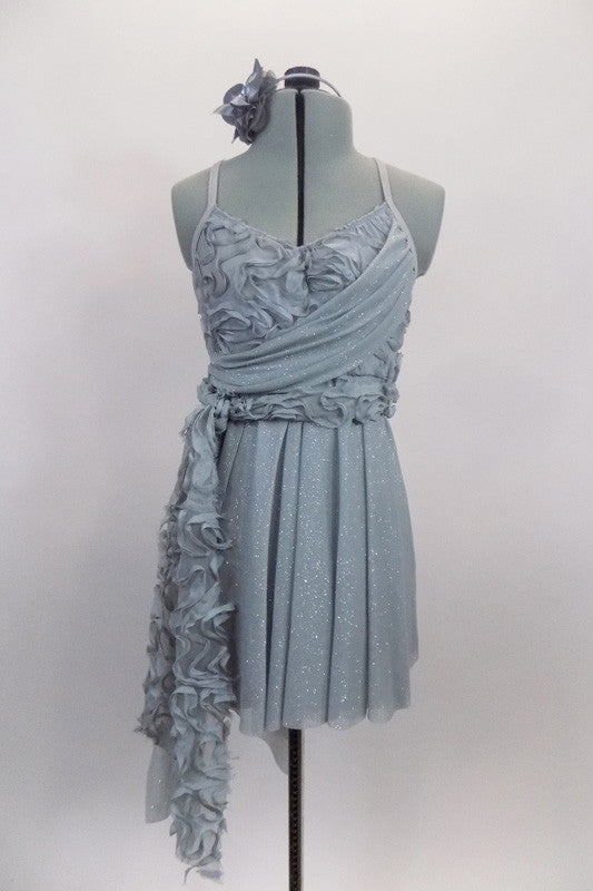Delicate pale grey glitter mesh camisole dress has rose ribbon bodice with attached sash and brief. The shirt is longer at back which has criss-cross straps. Comes with hair accessory. Front