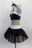 Black & white glitter dress has nude sheer center to create appearance of a 2- piece. Bust & waist have white band covered in crystals & large bow at right bust. Left side