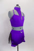 Purple 2-piece costume is a crystalled half top with choker neck attached to bust by triangle accent. Bottom is shorts with black tulle & feather bustle. Side