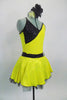 Yellow & black cross over dot-sequin dress has black belt with crystal brooch.  Has back cross straps and black petticoat. Comes with black rose hair accessory. Side