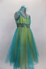 Teal soft tulle overlays gold leotard base of this A-line dress. Tulle gathers along bust at teal lace band. Layers of teal and gold tulle form the skirt. Comes with matching hair accessory. Side
